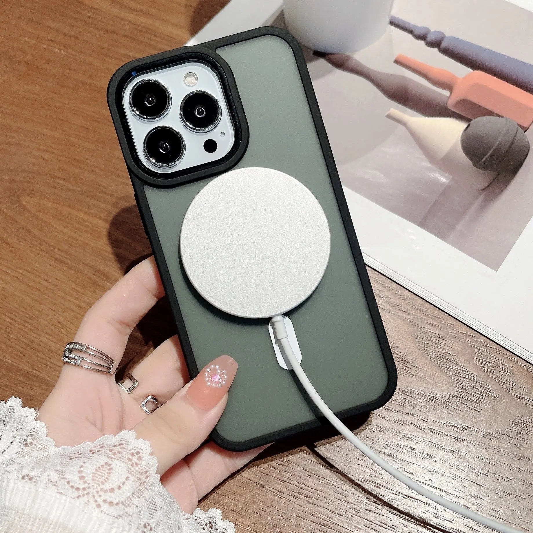 Magnetic matte frosted PC phone case for iPhone 15 Pro Max in black colour with back magnetic ring visible