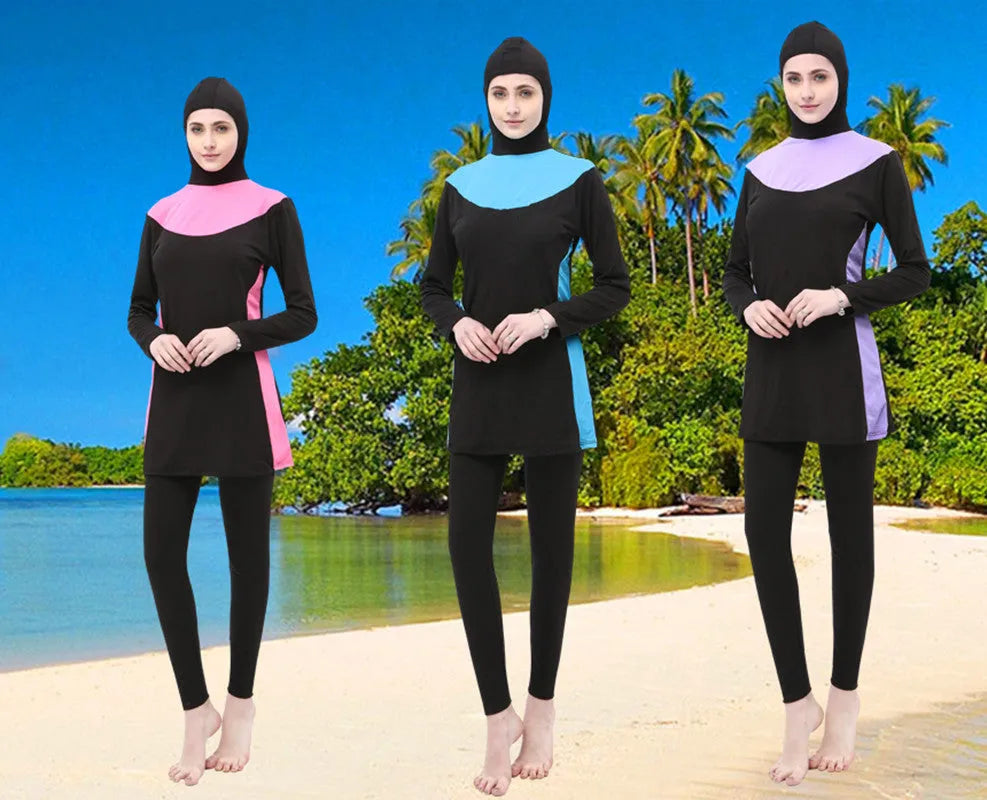Conservative long sleeve hooded swimsuit for women, shown as a black top and pants set.