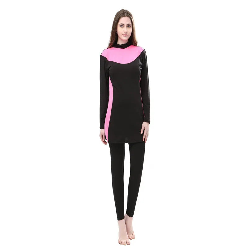 Conservative long sleeve hooded swimsuit for women, shown as a black top and pants set.