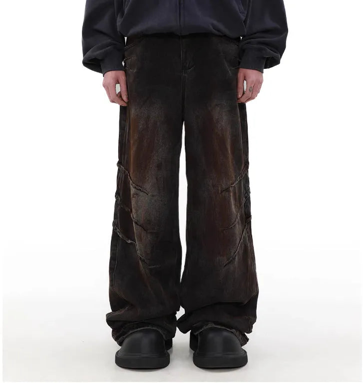 Men's distressed baggy straight jeans in rust colour denim with zipper fly