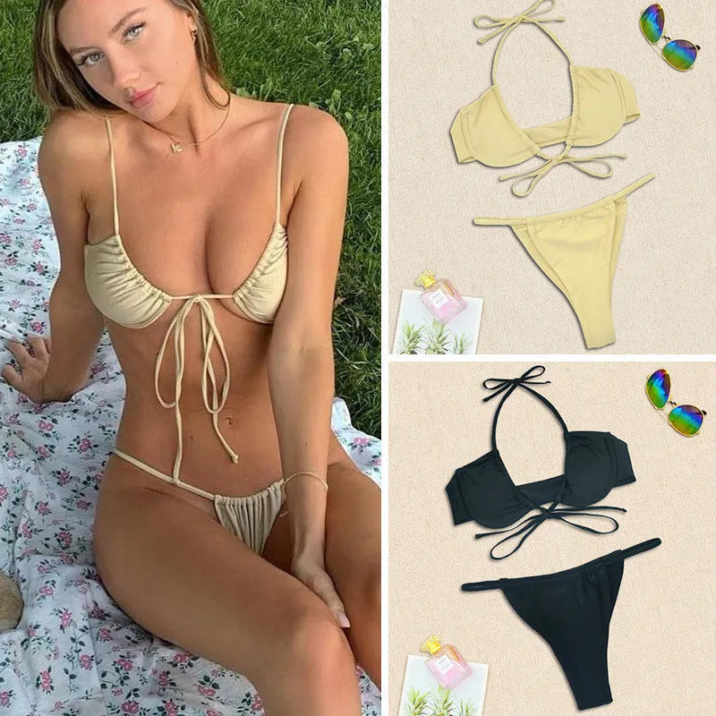 Women's black and mint green nylon bikini set with a fashion split design.