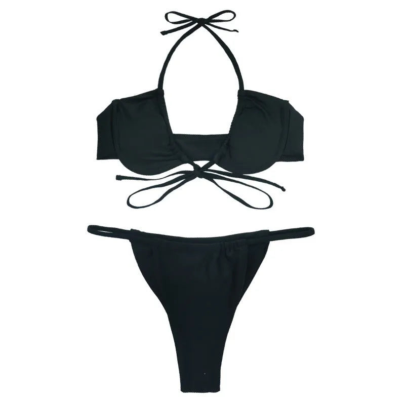Women's black and mint green nylon bikini set with a fashion split design.