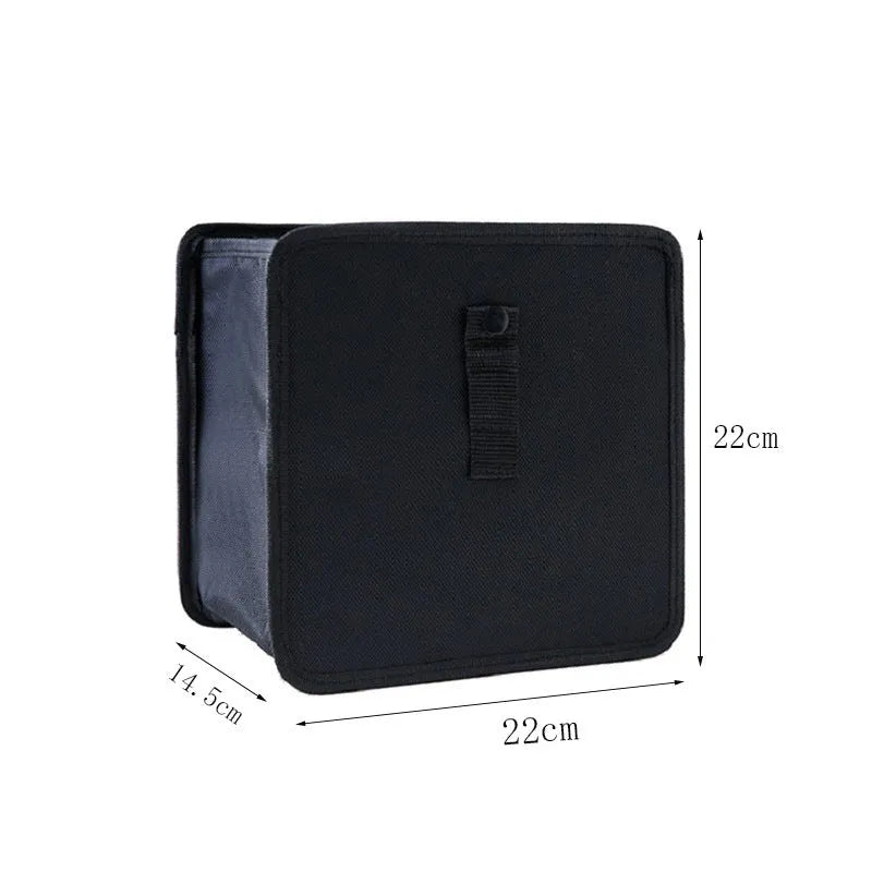 Black foldable car hanging trash can made from Oxford cloth, shown with dimensions.