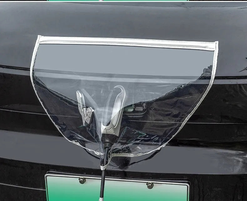 Black magnetic waterproof rain cover for electric vehicle charging gun and port, shown unfolded.