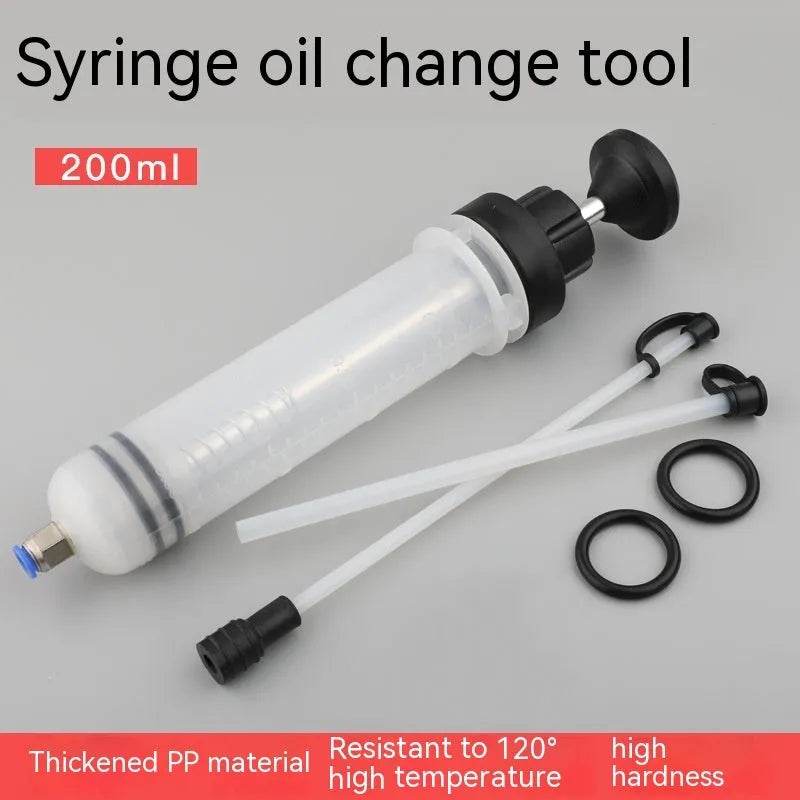 Manual oil change pump tool with syringe-style barrel for precise fluid transfer