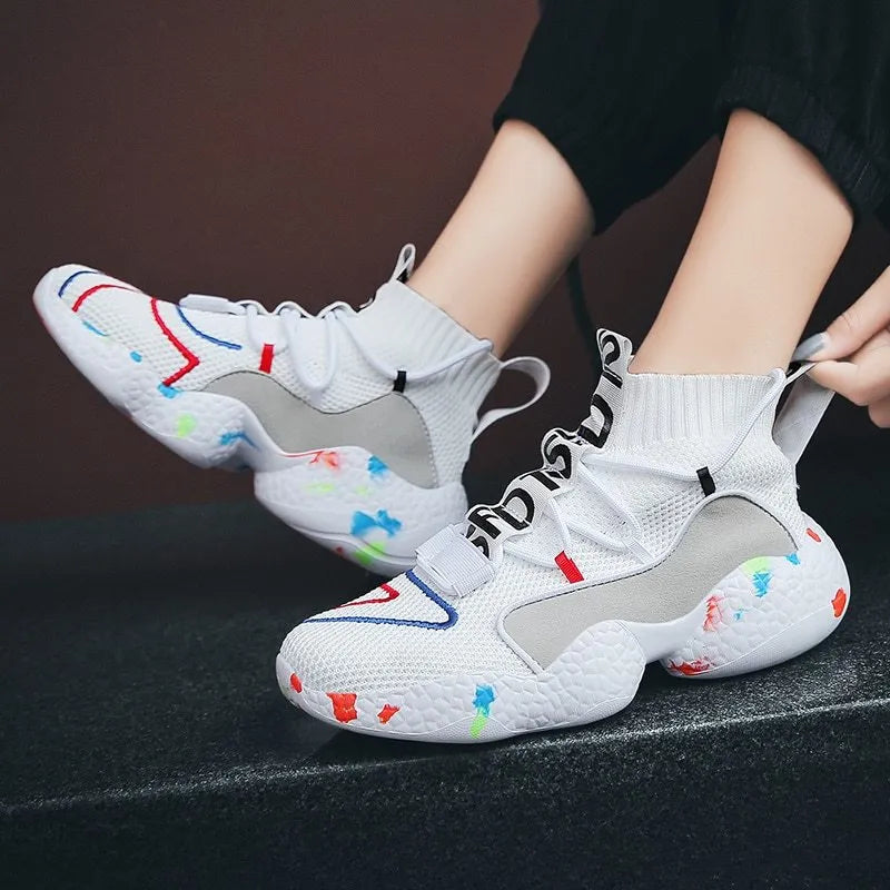Men's camouflage patterned sneakers with mesh upper and vulcanised rubber sole.