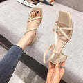 Women's apricot thick heel sandals with a block heel, open back, and side vents on a white background.