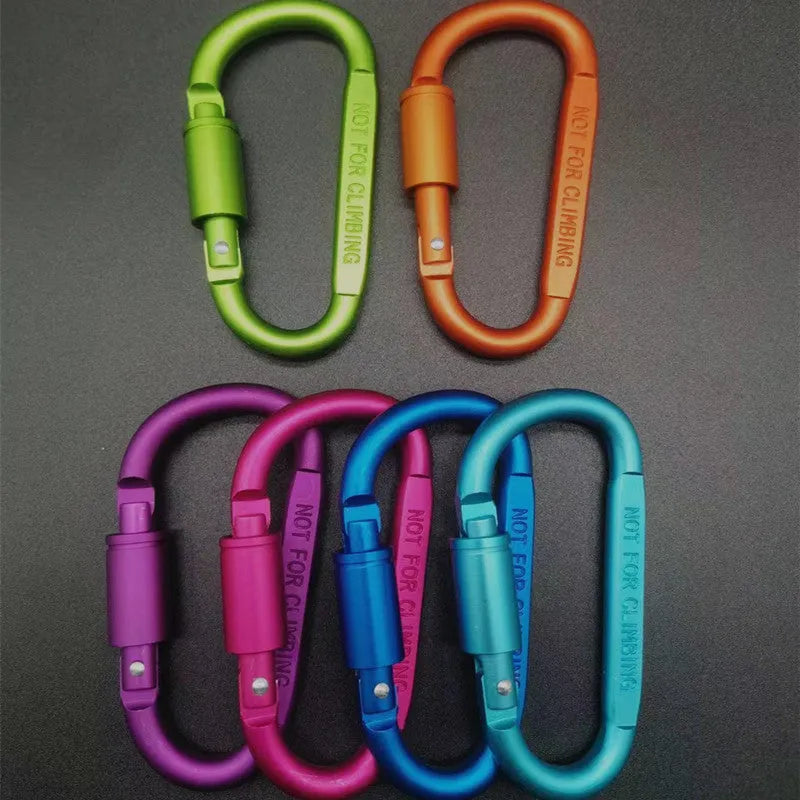 D-type aluminium locking carabiner in a selection of ten colours on a grey background.