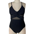 Women's mesh spliced backless one-piece swimsuit in solid black colour with polyester lining, Asian sizes S to 2XL