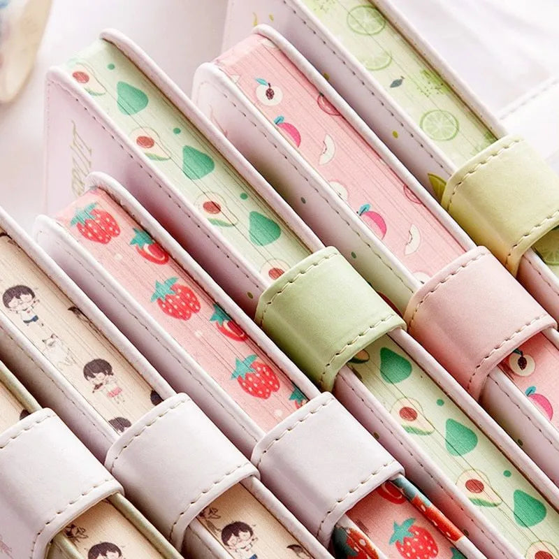 A6 fruit print notebook planner with magnetic buckle and colourful illustration of a lemon on imitation leather cover