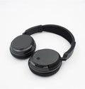 Black stereo wireless headset with USB FM transmitter and 3.5mm audio cable for 30-metre wireless range