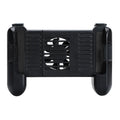 Black Bluetooth gaming controller for Apple iPhone on a table.