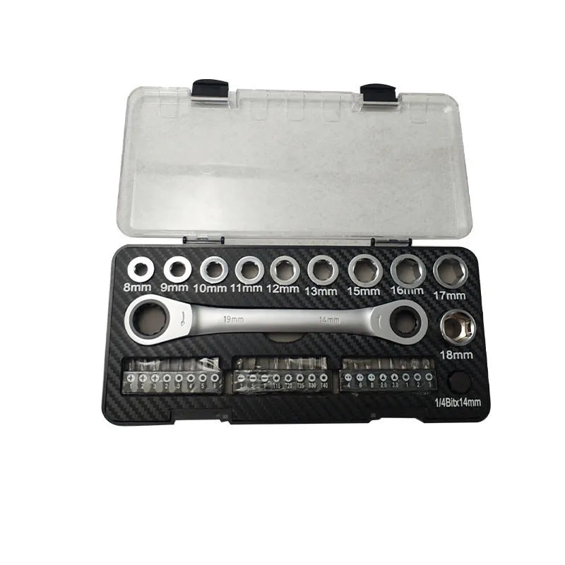 A two-way reversible ratchet wrench set with ten sockets and three screwdriver bits laid out on a surface.