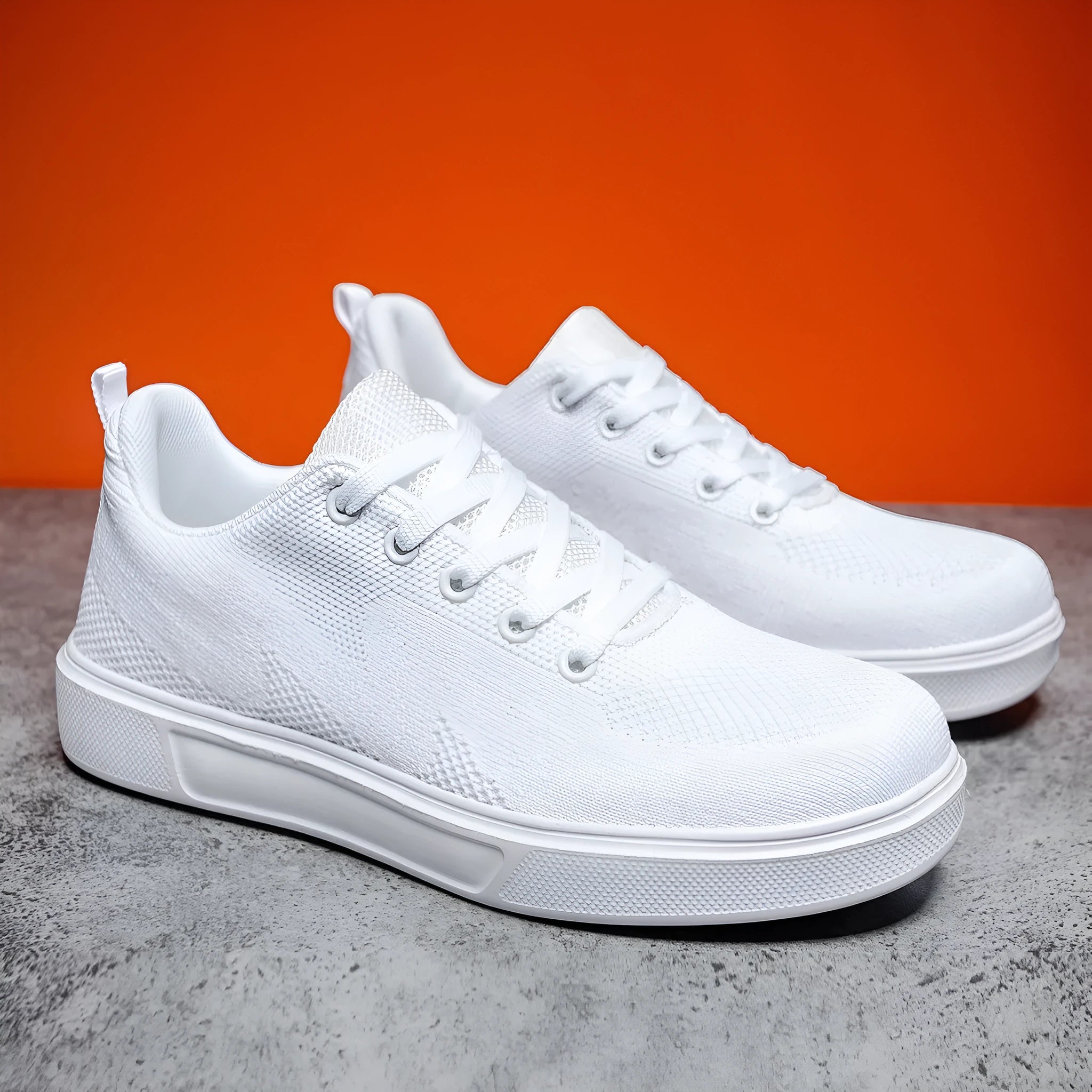 Light white unisex trainers with thick EVA sole and mesh upper in black or white colours