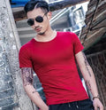 Men's bamboo fibre and polyester summer t-shirt in various colours on a hanger.