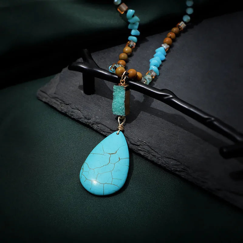 Turquoise blue heart-shaped water drop pendant necklace with mixed gem inlays on ball bead chain