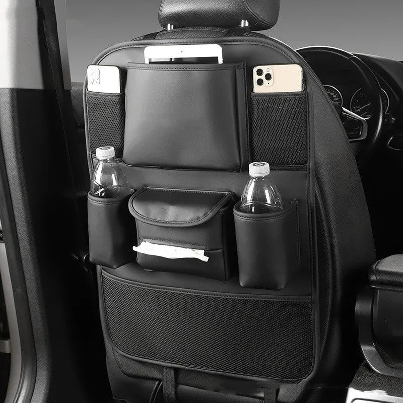 Leather car seat back storage bag hanging from a headrest, shown in grey colour.