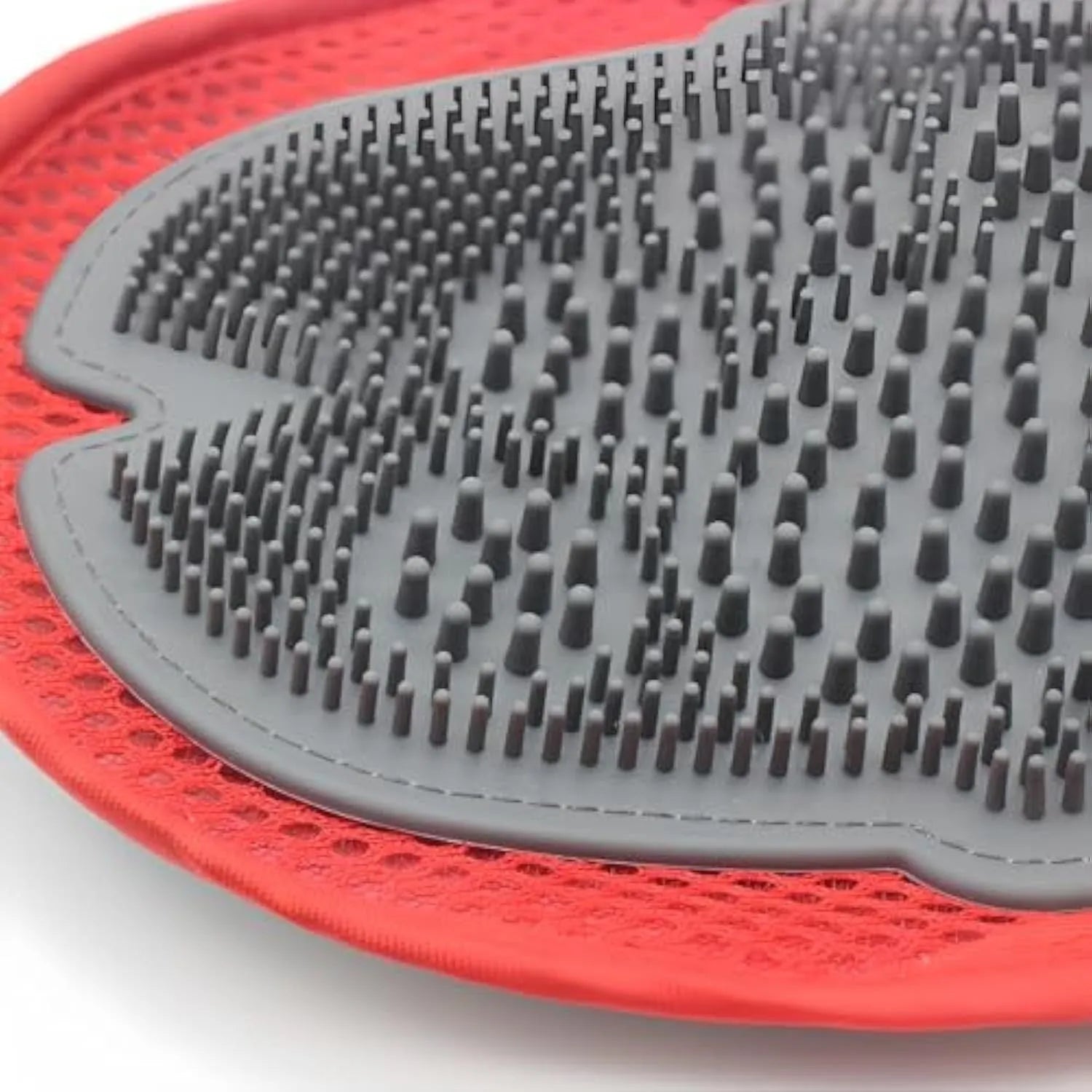 Red pet bathing glove grooming tool with integrated soft brush for washing dogs and cats.