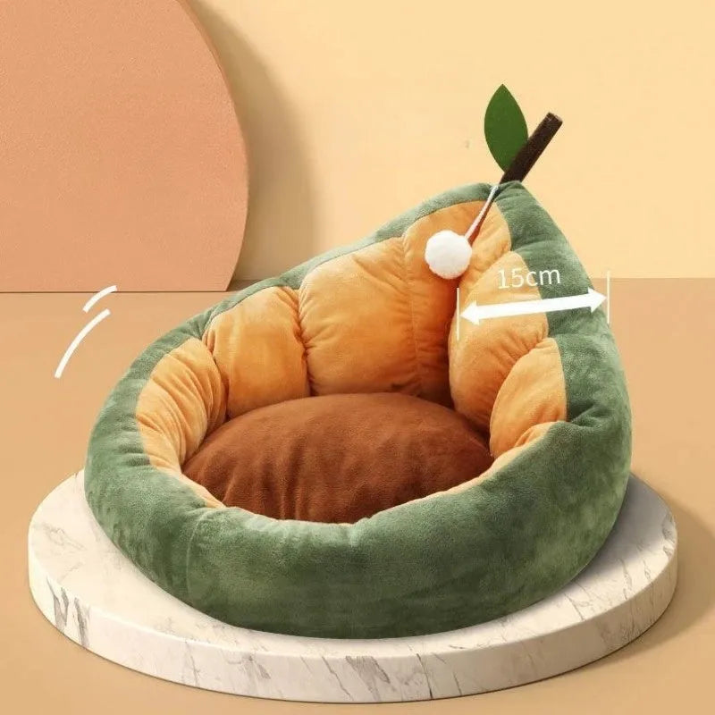Green cotton pet bed with a plush raised rim for a cat or small dog.