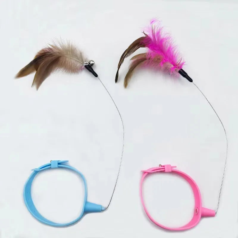 Blue adjustable cat collar with attached silicone teasing wand, dangling feathers, and bell