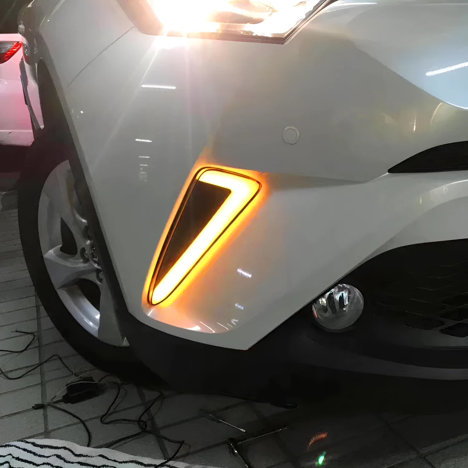 LED daytime running lights fog lights modified yellow light steering for 17 Toyota C-HR close up