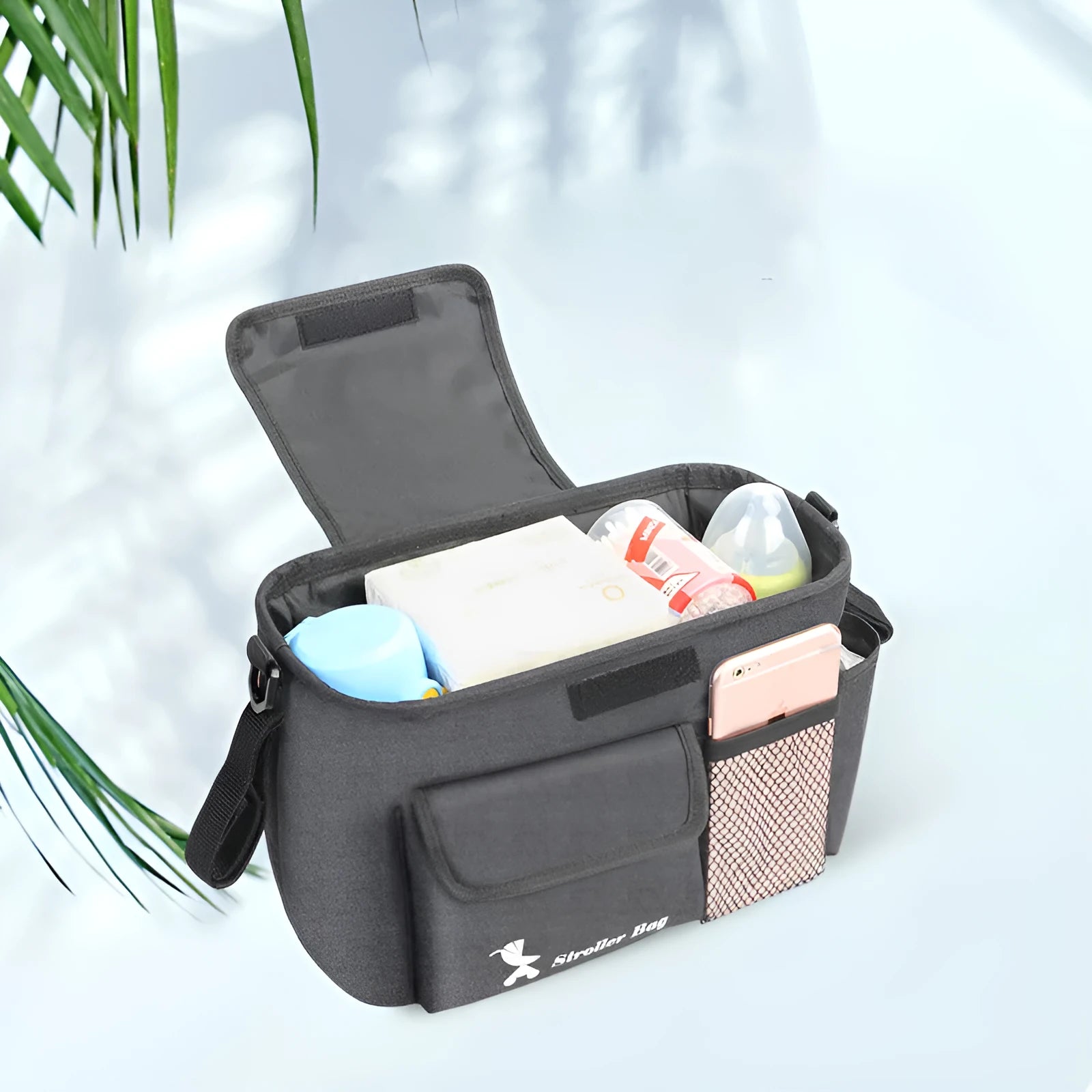 Black baby carriage bag made from 300D snowflake fabric, showing its structured shape and size.