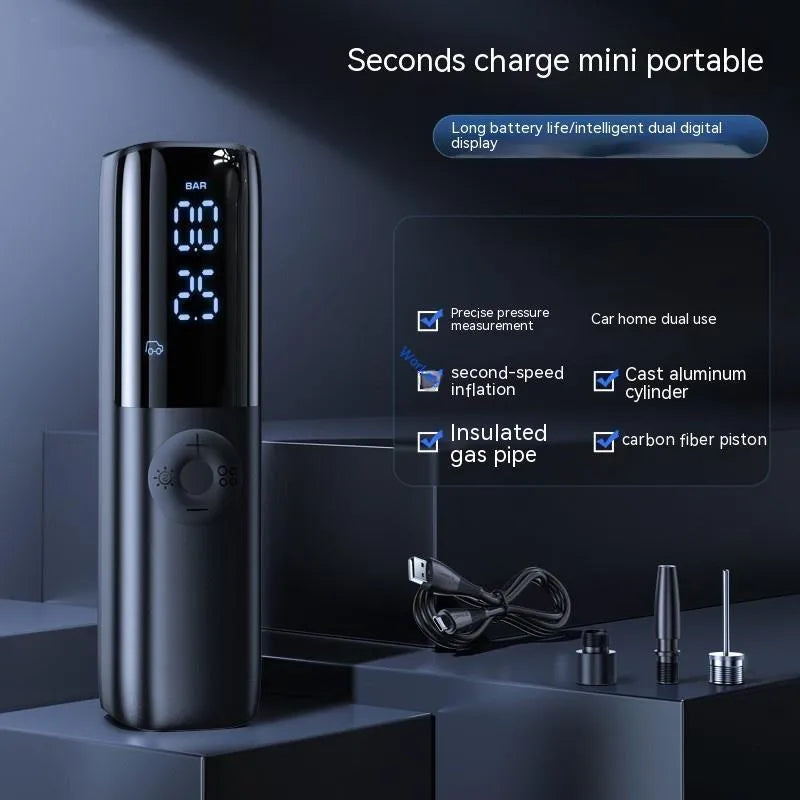 Black portable car tyre inflator with pressure gauge and plug connection