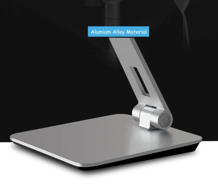 Foldable aluminium phone and tablet stand with black silicone protection showing 360-degree rotation capability
