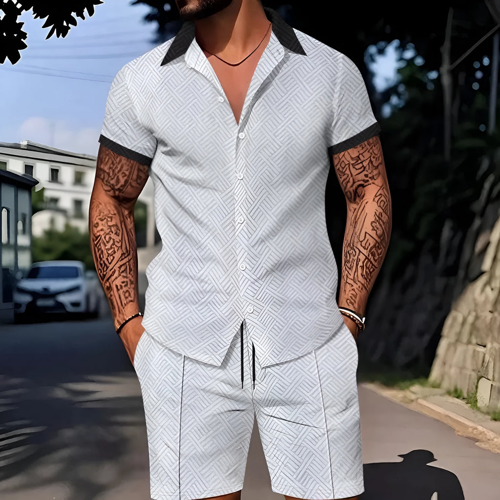 Man wearing a digital print short sleeve top and matching shorts from a casual suit set.