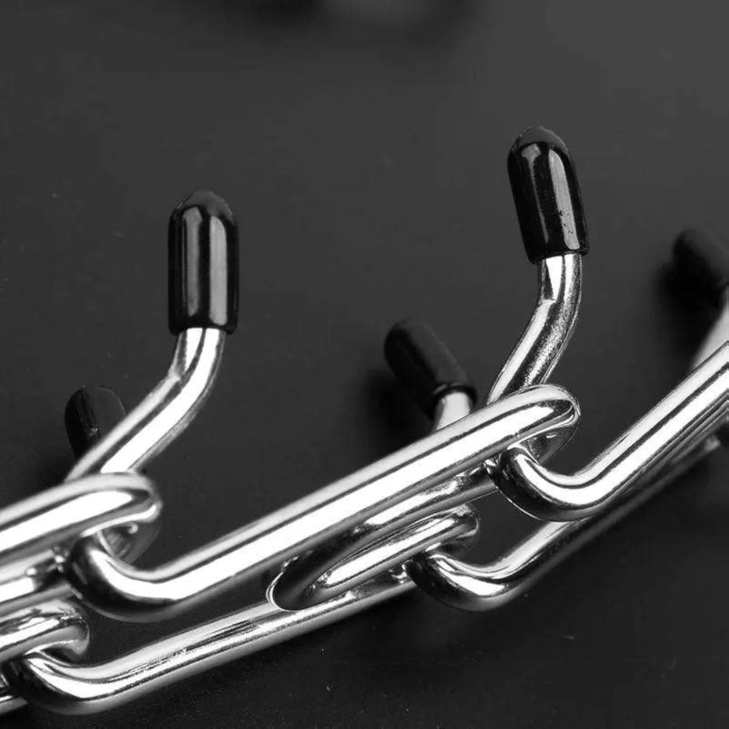 Stainless steel dog prong training collar with adjustable links and comfort rubber tips.