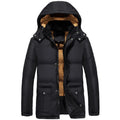 Man wearing a black hooded double-breasted padded winter jacket with a velvet lining.