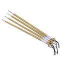 Four gold-coloured thin writing brushes with pine branch design, size 0, on a flat surface.