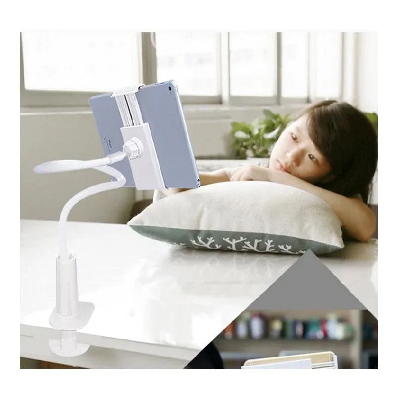 Flexible mount holder with suction base holding tablet at adjustable angle