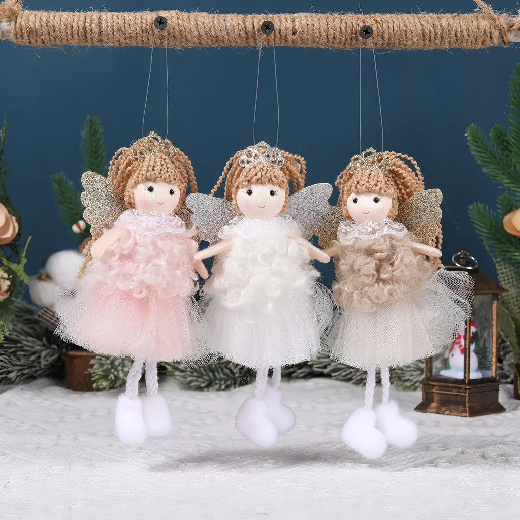 Cartoon angel cloth hair pendant on a girl's high ponytail in white, pink, and khaki colours.