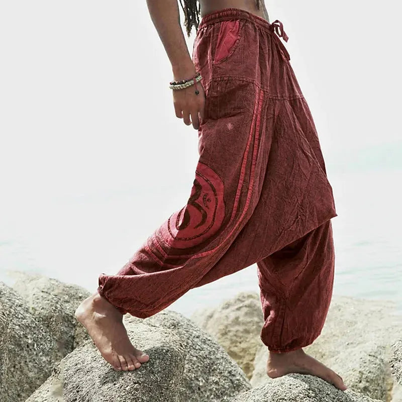 Dark green men's trousers with ethnic pattern and adjustable ankle ties