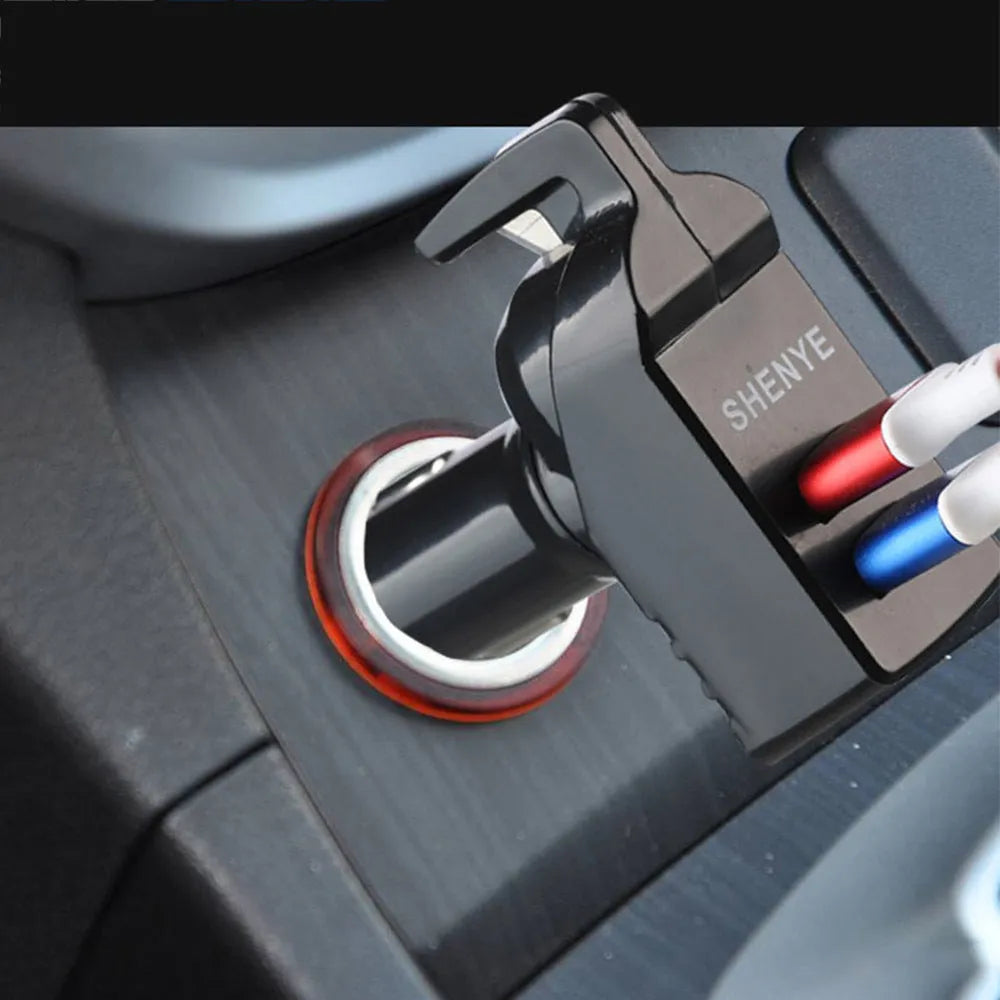 Black car safety hammer with seatbelt cutter and steel window-breaking tip on a light background
