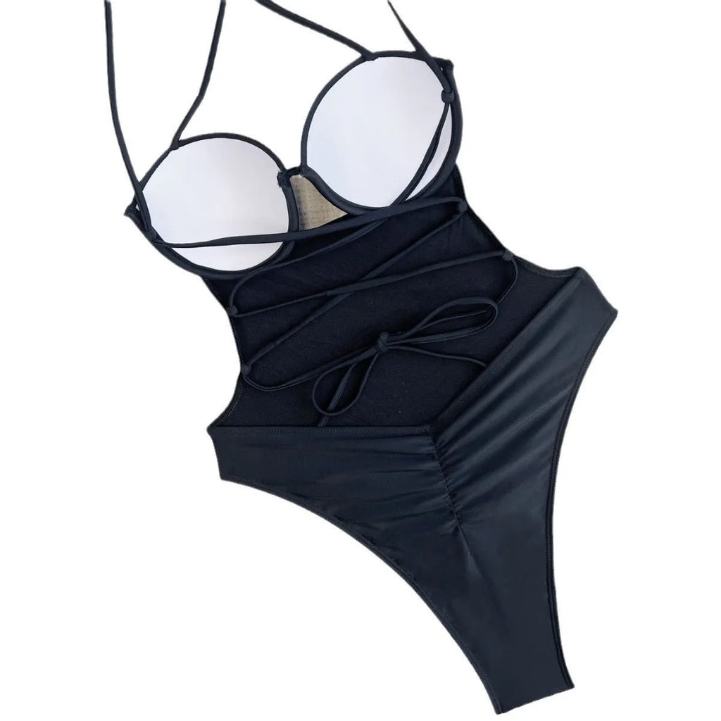 Women's solid black one-piece swimsuit on a hanger