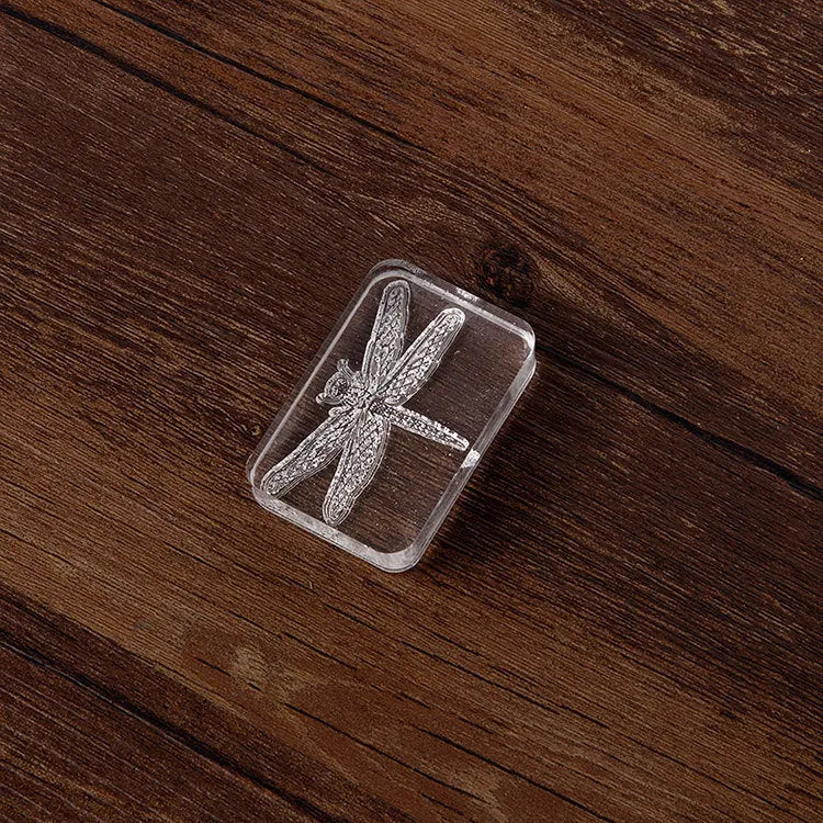 Transparent acrylic hand account seal with silicone inlay showing dragonfly or fei xue fern design options