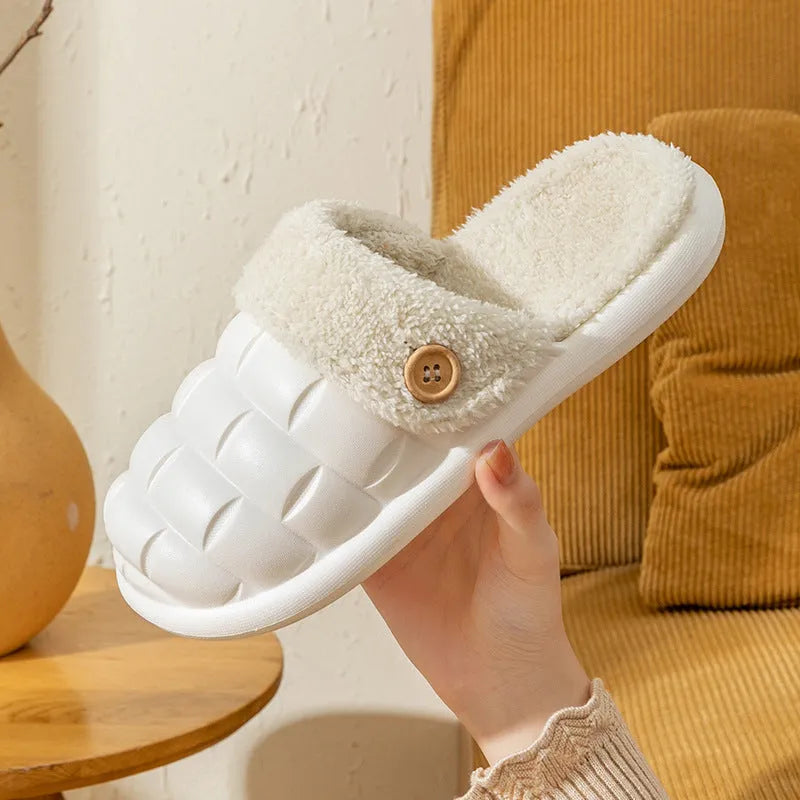 Women's pink detachable plush EVA winter house slippers with non-slip sole shown from the side.