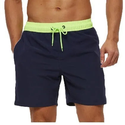 Men's blue stitching waist drawstring athletic shorts with a headband pocket and zipper fly.