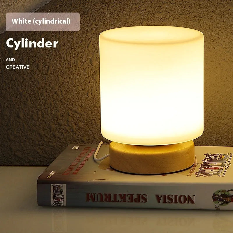 Nordic solid wood flower-shaped USB table lamp with touch dimming control on a desk.