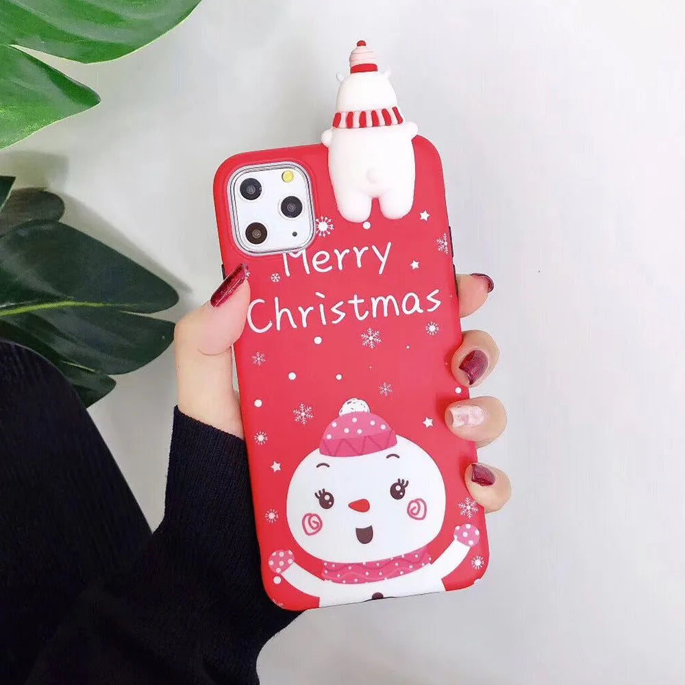 Christmas-themed silicone back cover case for iPhone on a red background.