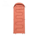 Ultra-light cotton camping sleeping bag quilt shown in ochre and olive green colours, folded for portability.