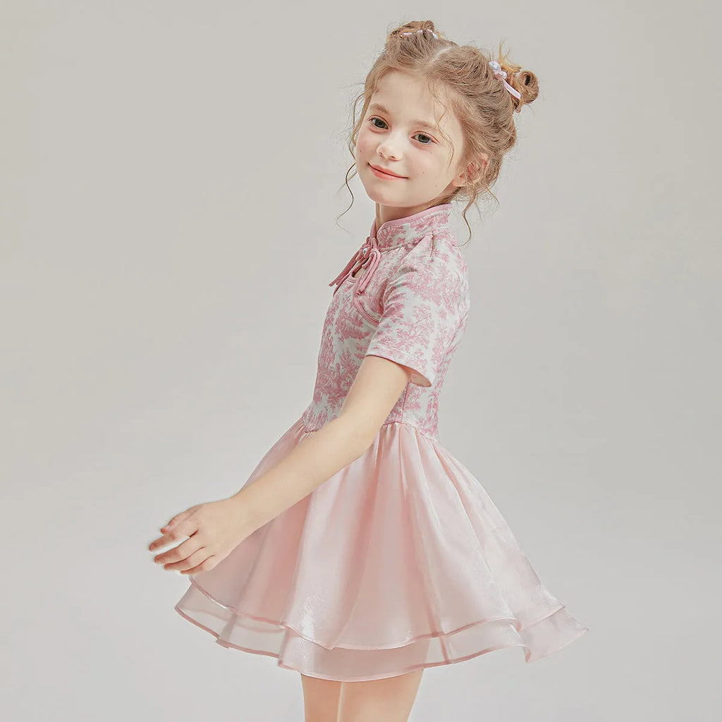 Children's patchwork two-piece swimsuit set with short sleeves, shown in a suit colour.