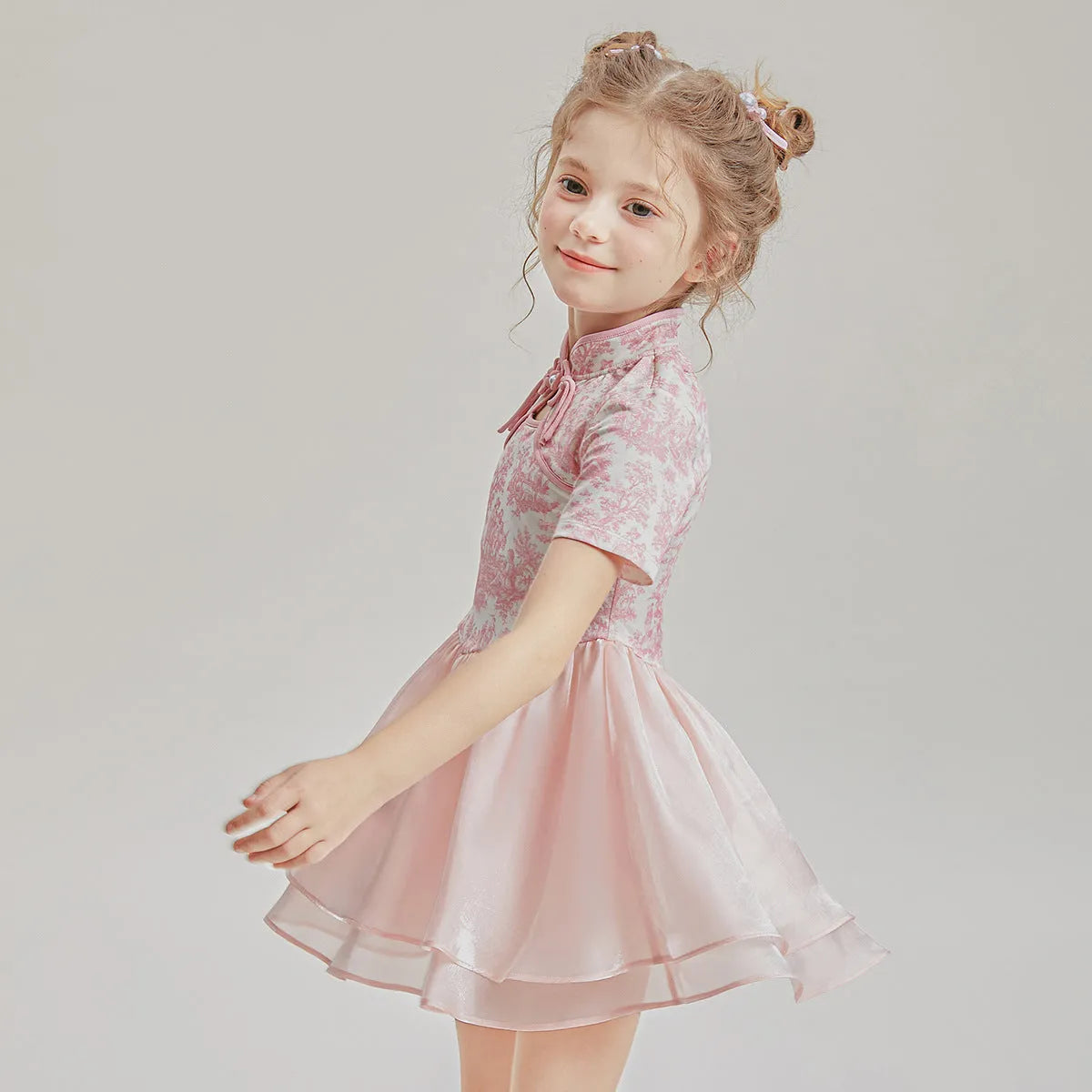 Children's patchwork two-piece swimsuit set with short sleeves, shown in a suit colour.