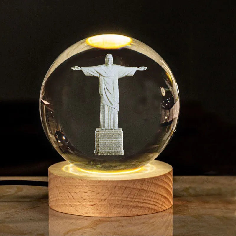 White crystal ball desk ornament on a wooden warm light base, showing purity-themed designs.