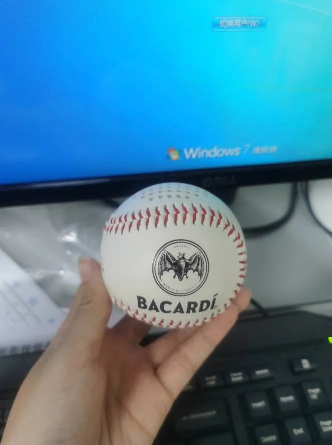 Baseball home shaped Bluetooth speaker in green colour showing front design with speaker grille