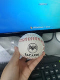 Baseball home shaped Bluetooth speaker in green colour showing front design with speaker grille