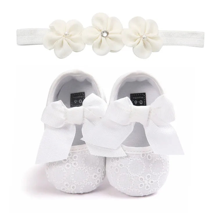 Soft sole pink baby princess shoes for infants shown next to size tags for 11cm, 12cm, and 13cm.