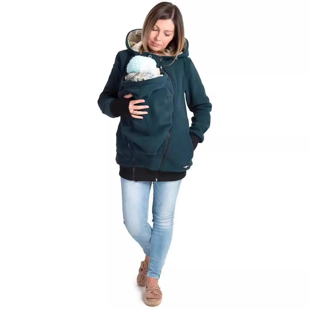 Red loose-fit polar fleece women's sweater with long sleeves on a hanger.